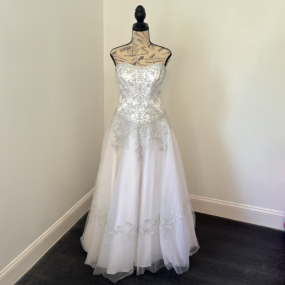 Cotillion: 50 inches from top to bottom and 40 inches from waist to bottom